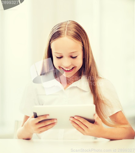 Image of girl with tablet pc at school