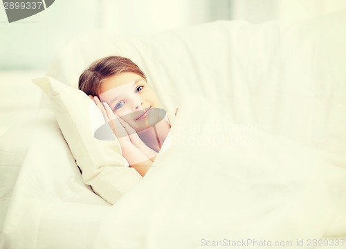 Image of little girl sleeping at home