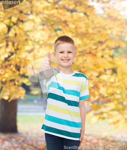 Image of little boy in casual clothes with arms crossed