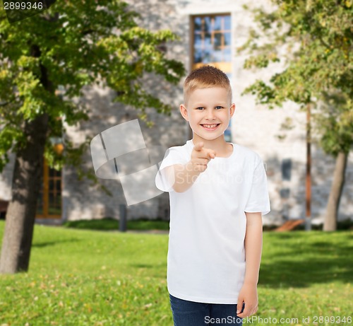 Image of smiling little boy in white blank t-shirt