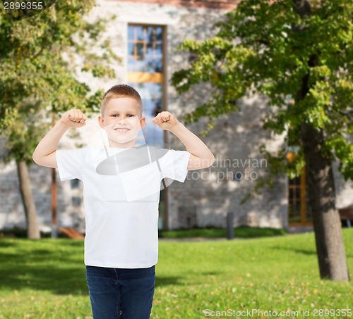 Image of smiling little boy in white blank t-shirt