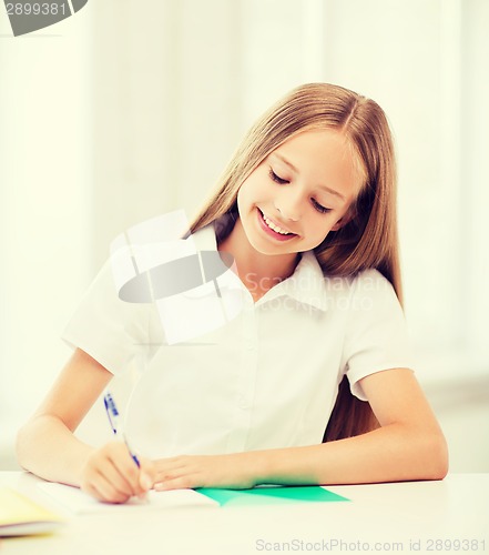 Image of student girl studying at school