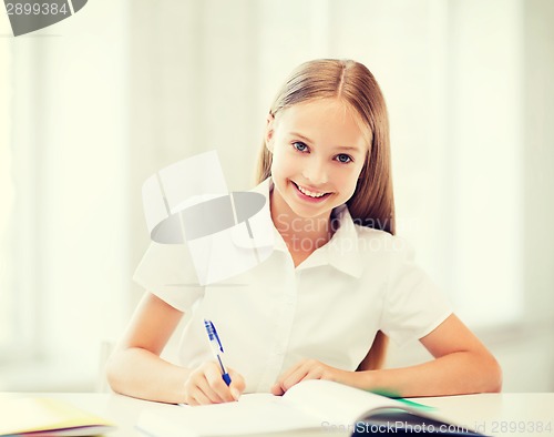Image of student girl studying at school