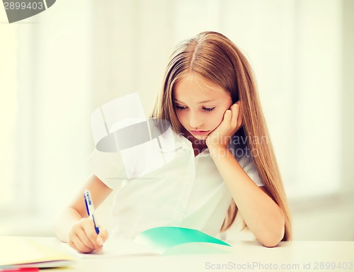 Image of student girl studying at school