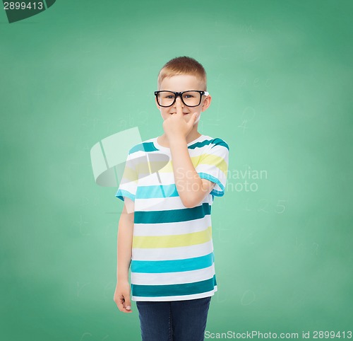 Image of smiling little boy in eyeglasses