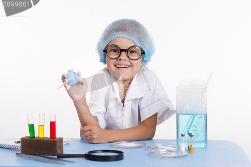 Image of Cheerful young chemist