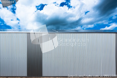 Image of warehouse with solar panels