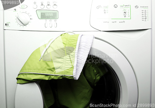 Image of Trousers and laundry.