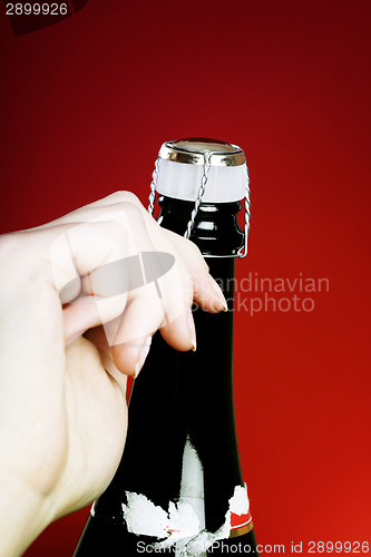 Image of Opening champagne bottle