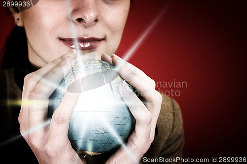 Image of Globe in a girl's hands