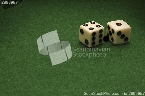 Image of Dice on a green felt