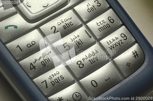 Image of Mobile cell telephone buttons with Arabic symbols