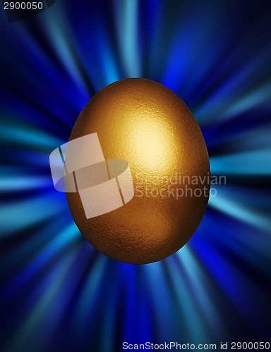 Image of Golden egg in a blue vortex