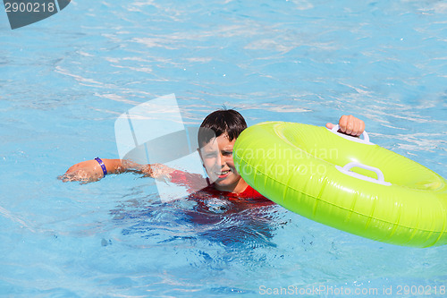 Image of Boys swimsuit floating in the pool float 