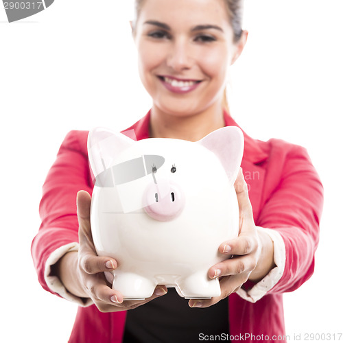 Image of Business woman with a piggy bank