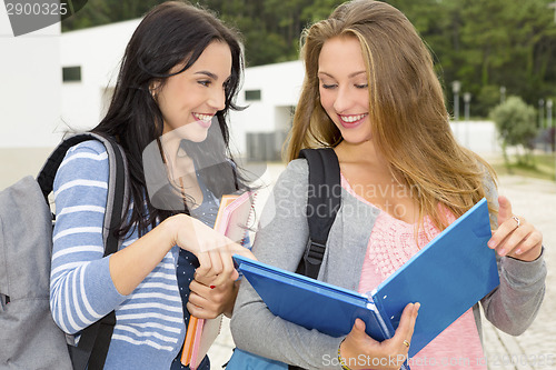 Image of Two beautiful teenage students