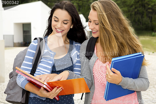 Image of Two beautiful teenage students