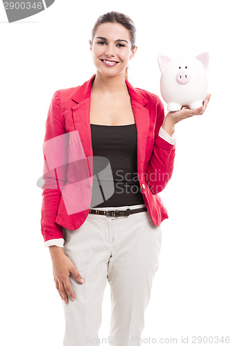 Image of Business woman with a piggy bank