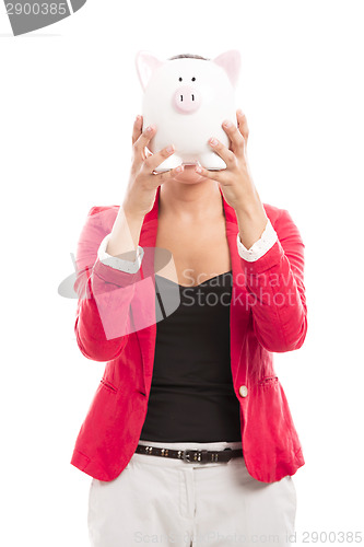 Image of Business woman with a piggy bank