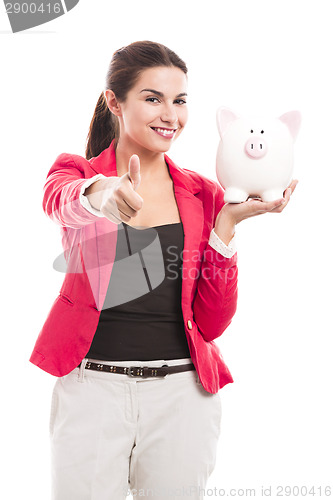 Image of Business woman with a piggy bank