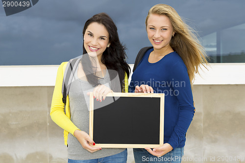 Image of Two beautiful teenage students