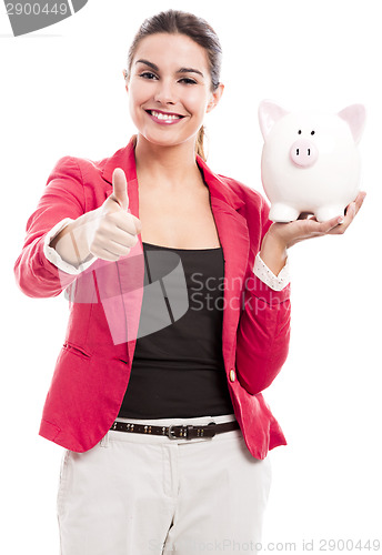 Image of Business woman with a piggy bank