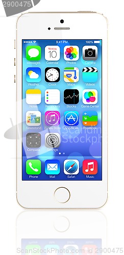 Image of Gold iPhone 5s showing the home screen with iOS7.