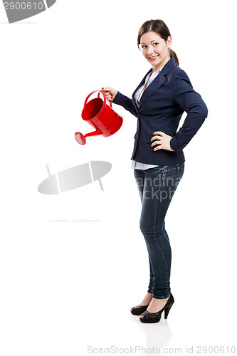 Image of Businesswoman watering 