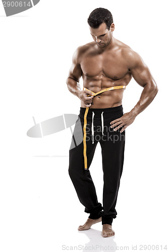 Image of Muscle man taking is measures