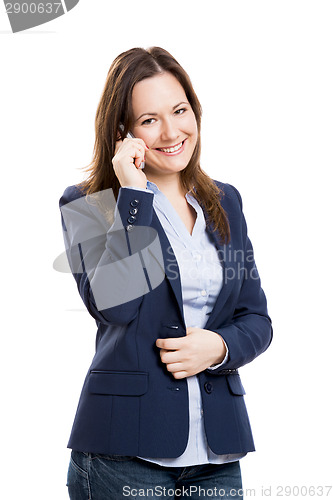 Image of Business woman with a cellphone texting