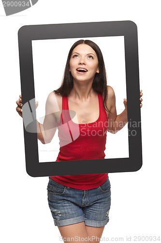 Image of Excited teen girl looking through frame