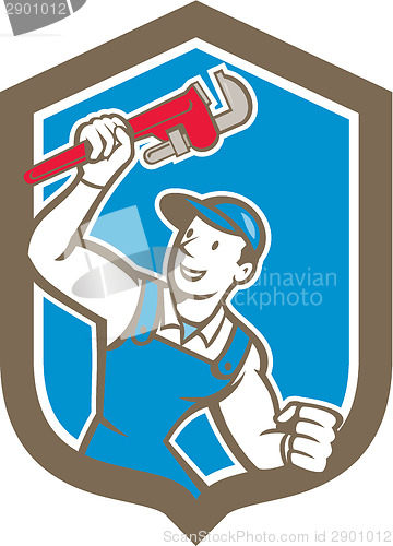 Image of Plumber Holding Monkey Wrench Shield Cartoon