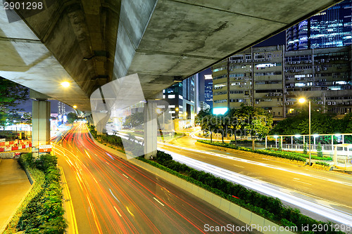 Image of Traffic trail on road in city