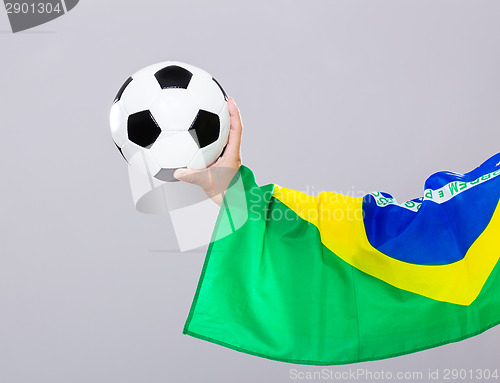 Image of Man arm hold soccer ball