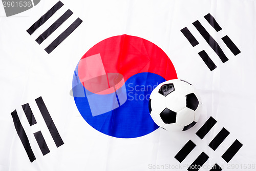 Image of South Korean flag and soccer ball