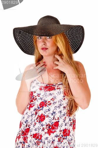 Image of Woman with black hat.