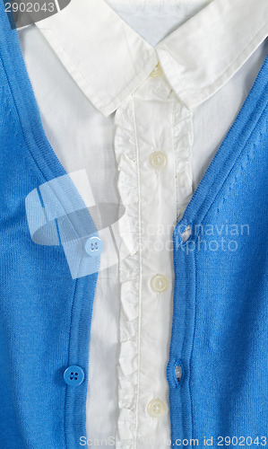 Image of Trendy blue cardigan with a white shirt