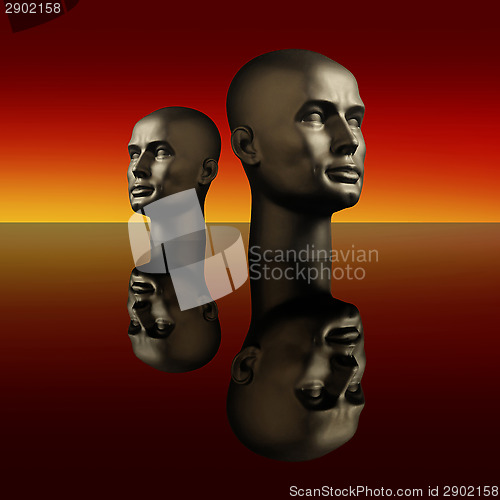 Image of Two mannequin heads on a dark reflective surface