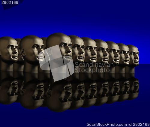 Image of Metallic heads lined up on a reflective black surface