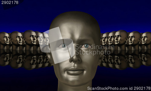 Image of Silver mannaquin head flanked by two groups of heads