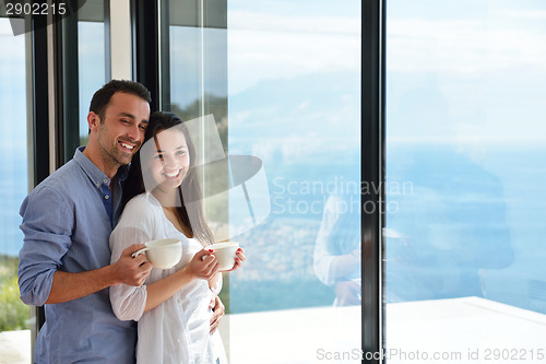 Image of relaxed young couple at home