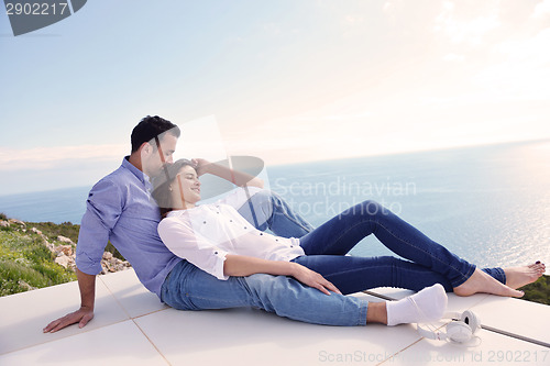 Image of relaxed young couple at home