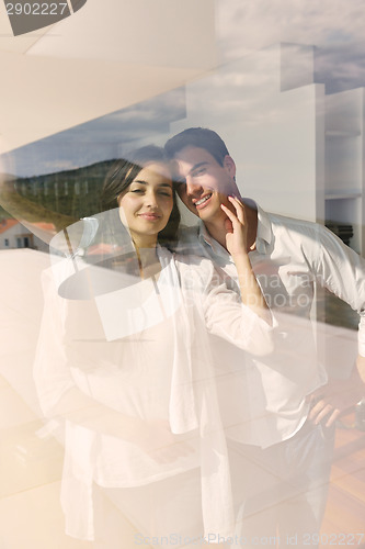 Image of relaxed young couple at home