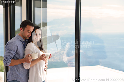 Image of relaxed young couple at home