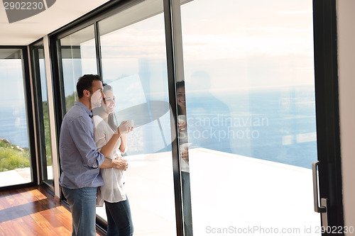 Image of relaxed young couple at home