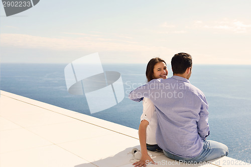 Image of relaxed young couple at home