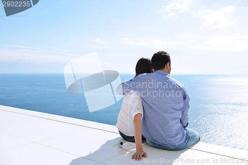 Image of relaxed young couple at home