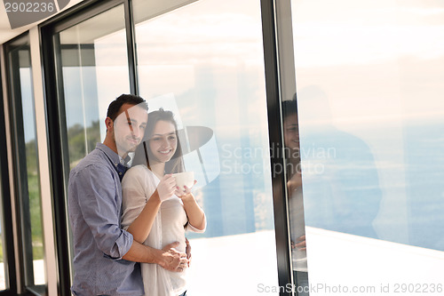 Image of relaxed young couple at home