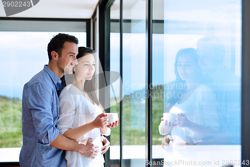 Image of relaxed young couple at home