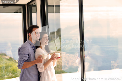 Image of relaxed young couple at home